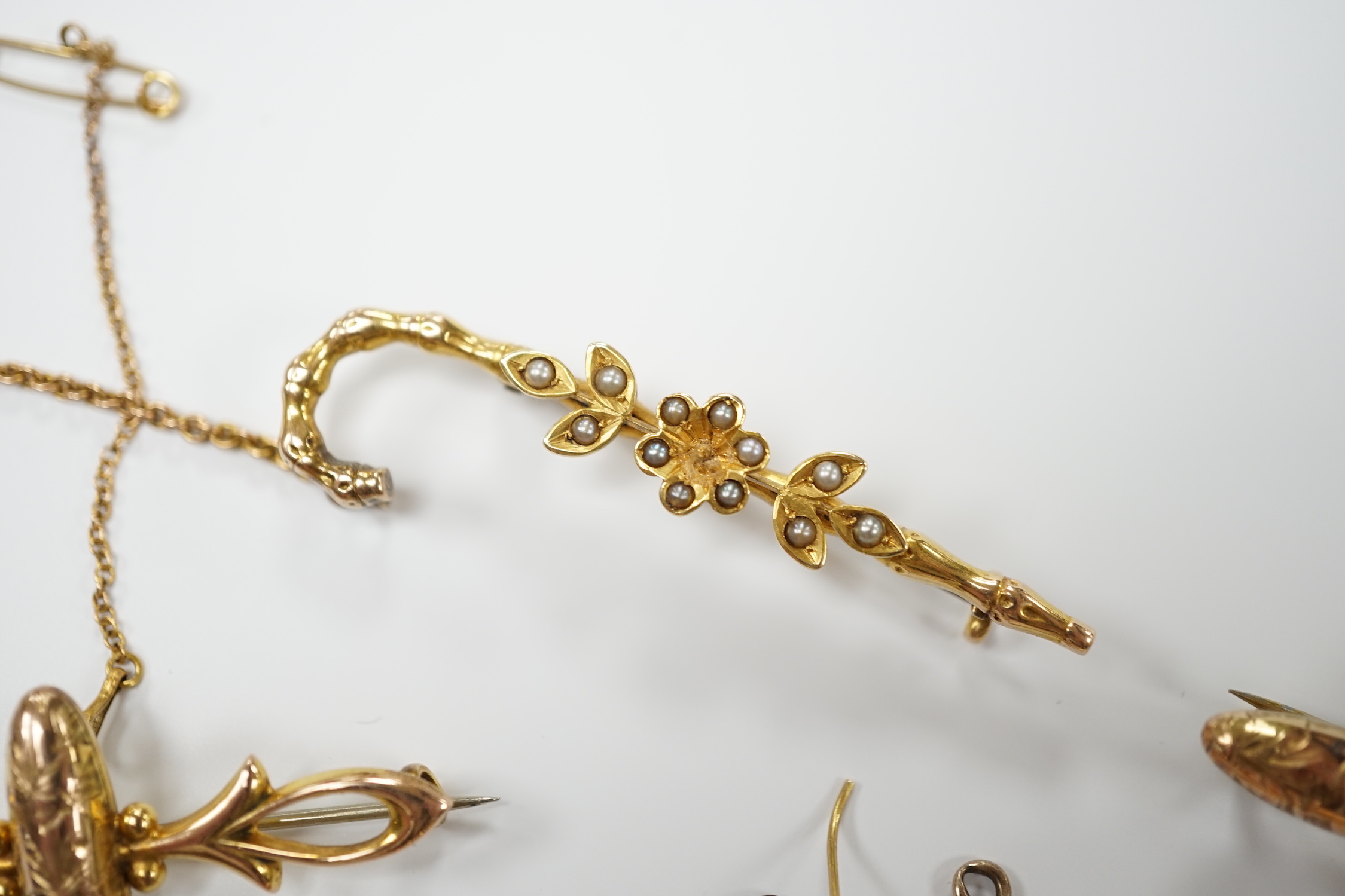 A group of Victorian and later jewellery including a yellow metal overlaid, carnelian and bloodstone set fob, yellow metal and seed pearl set cane bar brooch, earrings, ring etc.